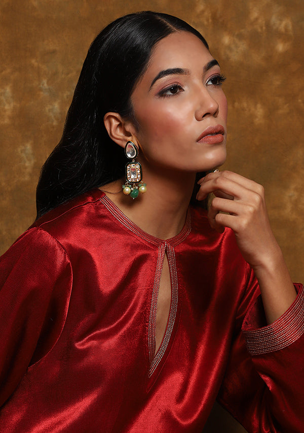 Red Long Mushru Kurta with Gold Trimmings paired with Straight Pants