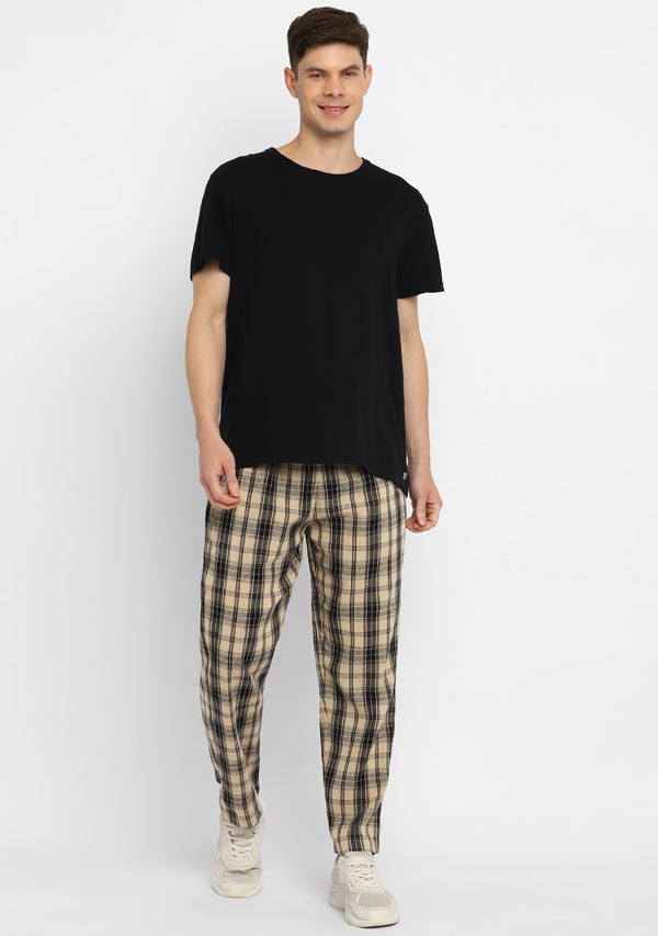 Checked trousers  BeigeBlack checked  Men  HM IN